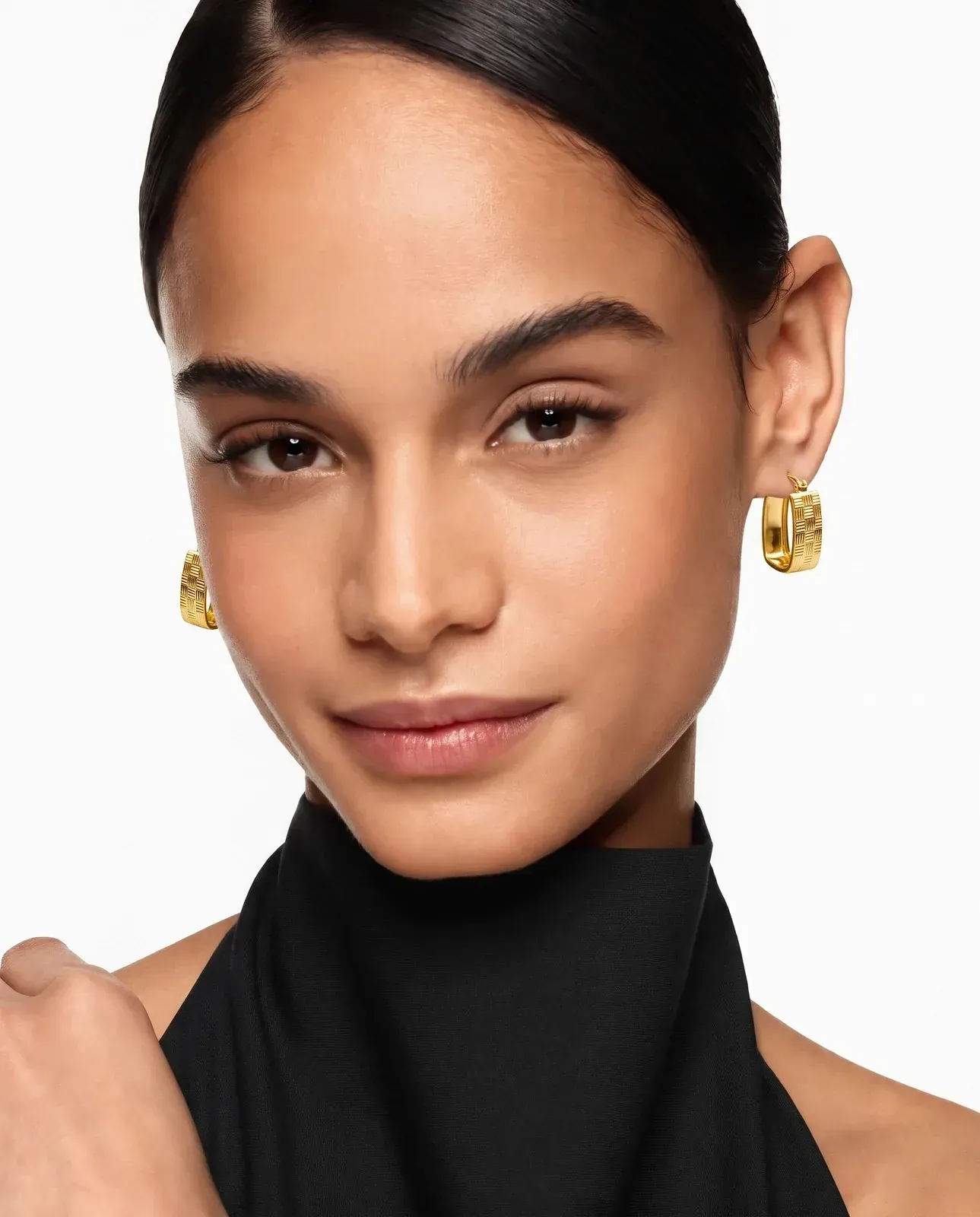 A model wearing the Basket Weave Clip Earrings