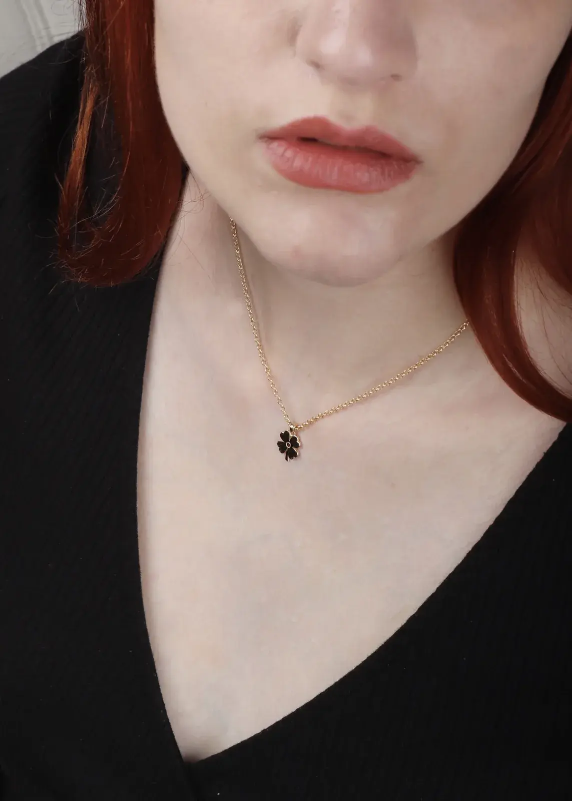 Polished Four-Leaf Clover Charm — worn
