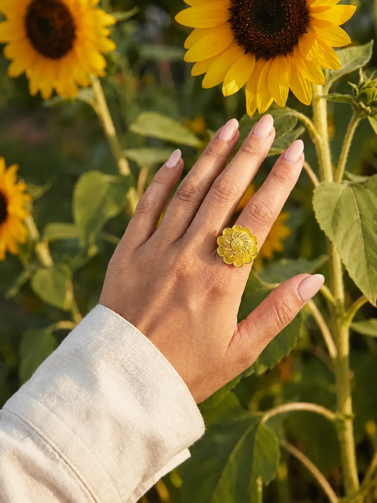 Filigree Pinwheel Flower Ring — worn